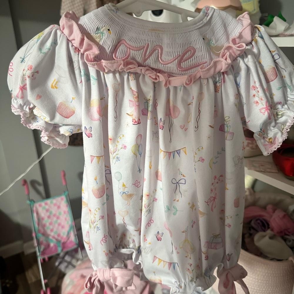 Adorable Baby Romper with Pink Accents